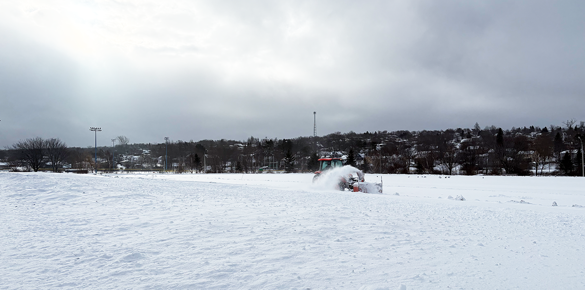 Snow plow clearing the Atlantic Street Track in Sydney.